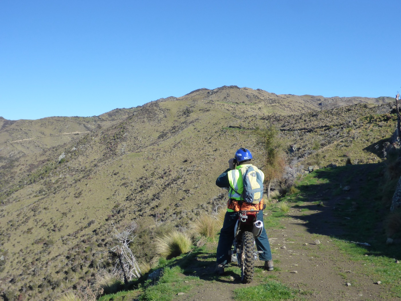 Worker on a rural motorbike